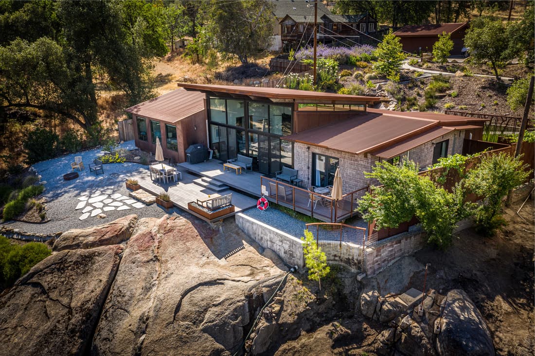 Luxury hillside vacation home with expansive deck and ocean views